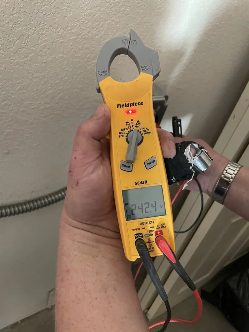 Voltage testing with clamp meter during Electrical Installation Services in Shrewsbury